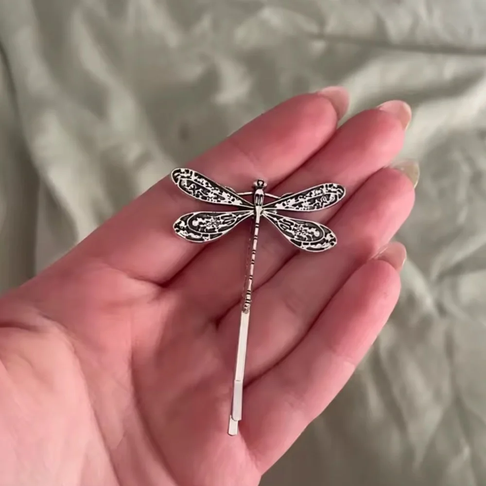 Anthropologie charming metallic